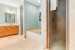 Master Bathroom Includes Separate Walk-in Shower and Garden Tub